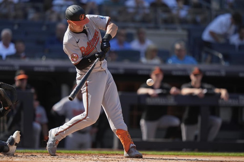 Baltimore Orioles' Ryan Mountcastle hits a three-run double during the second inning of a baseball game against the New York Yankees, Thursday, June 20, 2024, in New York. (AP Photo/Frank Franklin II)
