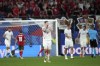 Czech Republic's Ladislav Krejci, centre, reacts at the end of Group F match between Portugal and Czech Republic at the Euro 2024 soccer tournament in Leipzig, Germany, Tuesday, June 18, 2024. (AP Photo/Ebrahim Noroozi)