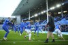 FILE - Everton players warm up before the English Premier League soccer match between Everton and Liverpool at the Goodison Park stadium in Liverpool, Britain, Wednesday, April 24, 2024. The Texas-based Friedkin Group is in exclusive discussions to buy a majority ownership of Everton, the Premier League club said Friday, June 21, 2024. (AP Photo/Jon Super, File)