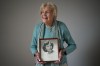 Vi Roden, who turned 101 on June 16, holds a photo of herself when she was 17, while posing for a photograph at her home in West Vancouver, on Friday, June 14, 2024. THE CANADIAN PRESS/Darryl Dyck