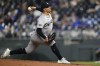New York Yankees relief pitcher Victor Gonzalez throws to a Kansas City Royals batter during the ninth inning of a baseball game Tuesday, June 11, 2024, in Kansas City, Mo. (AP Photo/Reed Hoffmann)