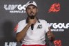 Abraham Ancer, of Fireballs GC, speaks with the media during a news conference after the first round of LIV Golf Nashville at The Grove, Friday, June 21, 2024, in College Grove, Tenn. (Sam Greenwood/LIV Golf via AP)