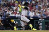 Arizona Diamondbacks' Geraldo Perdomo hits a run-scoring single against Philadelphia Phillies pitcher Seranthony Dominguez during the eighth inning of a baseball game, Friday, June 21, 2024, in Philadelphia. (AP Photo/Matt Slocum)