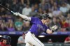 Colorado Rockies' Nolan Jones strikes out against Washington Nationals relief pitcher Robert Garcia to end the seventh inning of a baseball game Friday, June 21, 2024, in Denver. (AP Photo/David Zalubowski)
