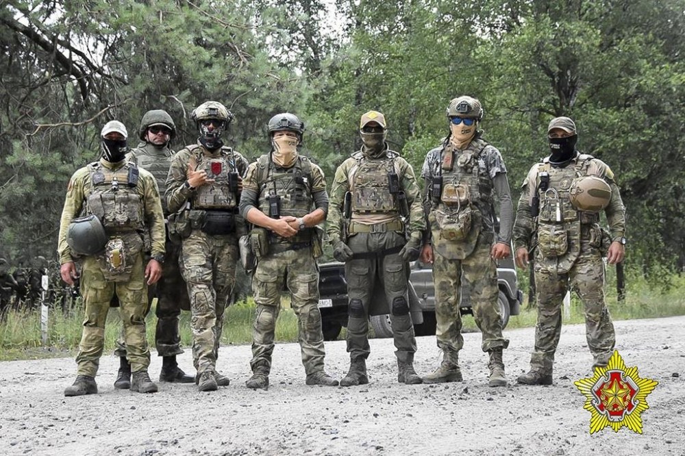 FILE - In this photo released by Belarus' Defense Ministry on July 20, 2023, Belarusian soldiers and mercenaries from Russia’s Wagner private military company pose for a photo amid maneuvers at a firing range near the border city of Brest, Belarus. On June 24, 2023, the private military company ended a brief rebellion against the Russian Defense Ministry that Wagner chief Yevgeny Prigozhin accused of failing to supply his forces in Ukraine. (Belarus' Defense Ministry via AP, File)