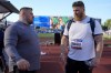 Ryan Crouser, right Joe Kovacs talk before the men's shot put during the U.S. Track and Field Olympic Team Trials Friday, June 21, 2024, in Eugene, Ore. (AP Photo/George Walker IV)