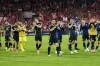 Scotland players react after a Group A match between Scotland and Switzerland at the Euro 2024 soccer tournament in Cologne, Germany, Wednesday, June 19, 2024. (AP Photo/Martin Meissner)