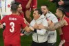 Turkey's head coach Vincenzo Montella celebrates with players at the end of a Group F match between Turkey and Georgia at the Euro 2024 soccer tournament in Dortmund, Germany, Tuesday, June 18, 2024. (AP Photo/Andreea Alexandru)