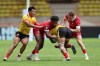Canada’s Josiah Morra (left) and Cooper Coats (right) tackle a Chinese player on Day 2 of the World Rugby Sevens Repechage at Louis II Stadium in Monaco on Saturday, June 22, 2024.
 THE CANADIAN PRESS/HO-World Rugby-Mike Lee
*MANDATORY CREDIT*