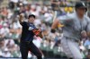 Detroit Tigers pitcher Kenta Maeda throws Chicago White Sox's Andrew Vaughn out at first base in the fourth inning of a baseball game, Saturday, June 22, 2024, in Detroit. (AP Photo/Paul Sancya)