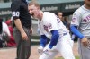 Chicago Cubs' Pete Crow-Armstrong reacts on third after hitting an RBI triple off New York Mets starting pitcher Tylor Megill in the first inning of a baseball game Saturday, June 22, 2024, in Chicago. (AP Photo/Charles Rex Arbogast)