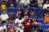 Toronto FC forward Cassius Mailula, left and New York Red Bulls defender Sean Nealis, right, battle for a header during an MLS soccer match, Saturday, June 22, 2024, in Harrison, N.J. (AP Photo/Julia Nikhinson)