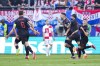 Albania players celebrate after teammate Albania's Klaus Gjasula, center, scored their side's second goal during a Group B match between Croatia and Albania at the Euro 2024 soccer tournament in Hamburg, Germany, Wednesday, June 19, 2024. The match ended in a 2-2 draw. (AP Photo/Ebrahim Noroozi)