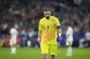 Italy's goalkeeper Gianluigi Donnarumma walks off after a Group B match between Spain and Italy at the Euro 2024 soccer tournament in Gelsenkirchen, Germany, Thursday, June 20, 2024. (AP Photo/Martin Meissner)