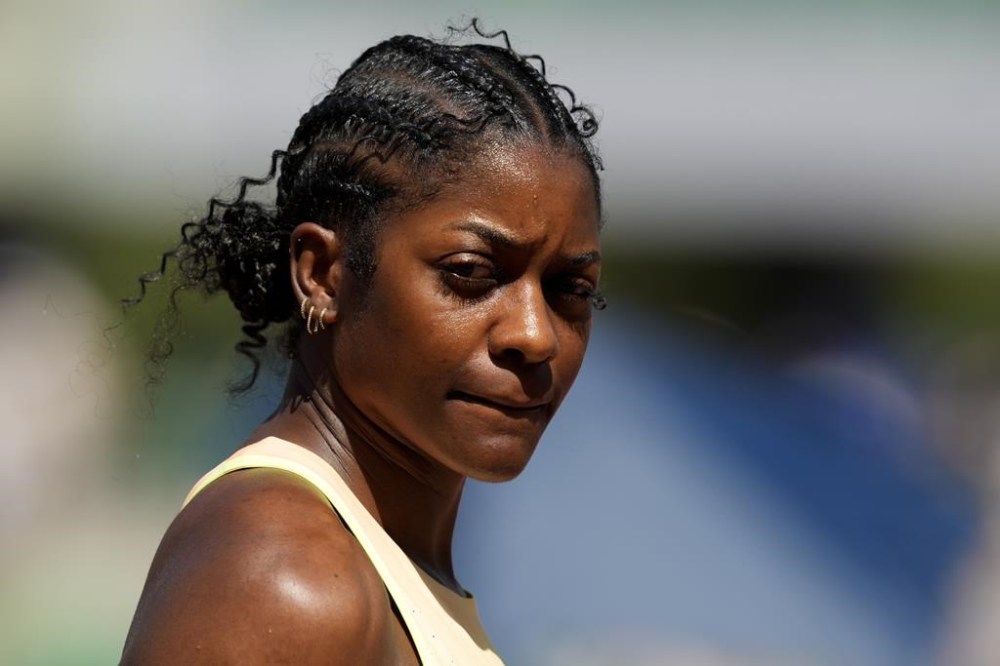 Kendall Ellis arrives for a heat women's 400-meter run during the U.S. Track and Field Olympic Team Trials Friday, June 21, 2024, in Eugene, Ore. (AP Photo/Charlie Neibergall)
