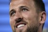 England's Harry Kane smiles during a press conference in Blankenhain, Germany, Sunday, June 23, 2024 ahead of the national team Group C soccer match against Slovenia at the Euro 2024 soccer tournament. (AP Photo/Thanassis Stavrakis)