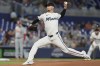 Miami Marlins pitcher Braxton Garrett (29) aims a pitch during the first inning of a baseball game against the St. Louis Cardinals, Monday, June 17, 2024, in Miami. (AP Photo/Marta Lavandier)