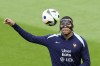 France's Kylian Mbappe controls the ball during a training session in Paderborn, Germany, Sunday, June 23, 2024. France will play against Poland during their Group D soccer match at the Euro 2024 soccer tournament on June 25. (AP Photo/Hassan Ammar)