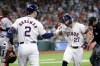 Houston Astros' Alex Bregman (2) and Jose Altuve (27) celebrate after a solo home run by Altuve against the Baltimore Orioles during the first inning of a baseball game Sunday, June 23, 2024, in Houston. (AP Photo/Michael Wyke)