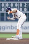 Houston Astros' Jeremy Pena celebrates after his two-run RBI double against the Baltimore Orioles during the sixth inning of a baseball game Sunday, June 23, 2024, in Houston. (AP Photo/Michael Wyke)