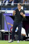 Switzerland's head coach Murat Yakin gives instructions during a Group A match between Switzerland and Germany at the Euro 2024 soccer tournament in Frankfurt, Germany, Sunday, June 23, 2024. (AP Photo/Martin Meissner)
