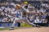 Milwaukee Brewers starting pitcher Tobias Myers works against a San Diego Padres batter during the first inning of a baseball game Sunday, June 23, 2024, in San Diego. (AP Photo/Gregory Bull)