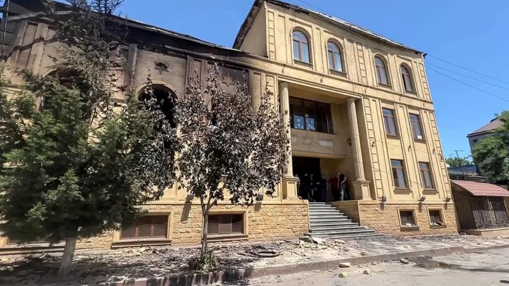 In this photo taken from video released by The Telegram Channel of the head of Dagestan Republic of Russia on Monday, June 24, 2024, a view of the damaged the Kele-Numaz synagogue in Derbent after a counter-terrorist operation in republic of Dagestan, Russia. Multiple police officers and several civilians, including an Orthodox priest, were killed by armed militants in Russia's southern republic of Dagestan on Sunday, its governor Sergei Melikov said in a video statement early Monday. (The Telegram Channel of the head of Dagestan Republic of Russia via AP)