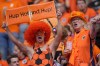 Fans of the Dutch soccer team cheer prior to a Group D match between the Netherlands and France at the Euro 2024 soccer tournament in Leipzig, Germany, Friday, June 21, 2024. (AP Photo/Mathias Schrader)
