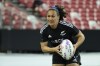 Portia Woodman-Wickliffe of New Zealand in action during HSBC rugby sevens series in Singapore, Sunday, May 4, 2024. Woodman-Wickliffe, the so-called Jonah Lomu of women's rugby, is aiming for another Olympic gold. A silver medalist in 2016 when rugby sevens made its Olympic debut, she was bitterly disappointed after losing the final to Australia. She became an Olympic champion in Tokyo and is determined to defend the title when she lines up in Paris. (AP Photo/Suhaimi Abdullah)