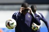 France's Kylian Mbappe adjusts his face mask during a training session in Paderborn, Germany, Monday, June 24, 2024. France will play against Poland during their Group D soccer match at the Euro 2024 soccer tournament on June 25. (AP Photo/Hassan Ammar)