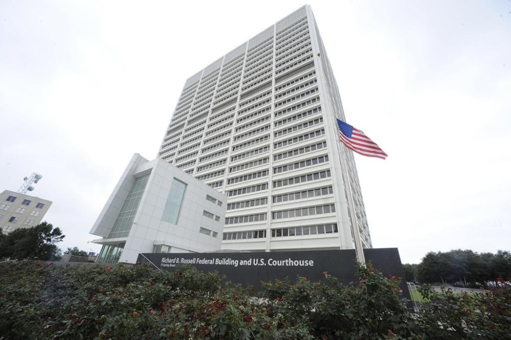 FILE - The Richard B. Russell Federal Building stands, July 21, 2012, in Atlanta. A new federal lawsuit challenges a Georgia law that expands cash bail and restricts organizations that help people pay bail so they can be released while their criminal cases are pending. (AP Photo/Mike Stewart, File)