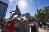 Micheal Mays pays his respects at a memorial for his late father, Willie Mays, before a baseball game between the San Francisco Giants and the Chicago Cubs in San Francisco, Monday, June 24, 2024. (AP Photo/Nic Coury)
