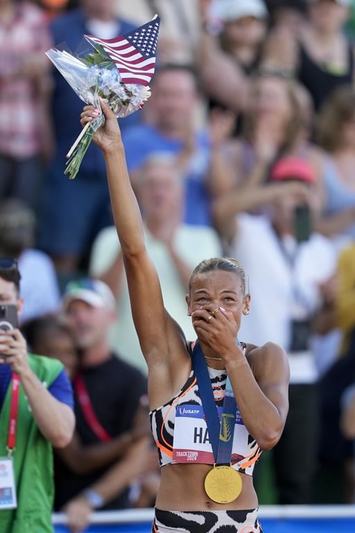 Anna Hall celebrates after winning the women's 800-meter run event and the overall in the heptathlon during the U.S. Track and Field Olympic Team Trials Monday, June 24, 2024, in Eugene, Ore. (AP Photo/Charlie Neibergall)