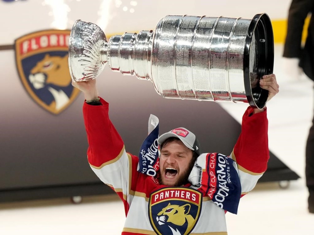 Florida Panthers forward Aleksander Barkov (16) hoists the Stanley Cup after winning the finals in Sunrise, Fla., on Monday, June 24, 2024. THE CANADIAN PRESS/Nathan Denette