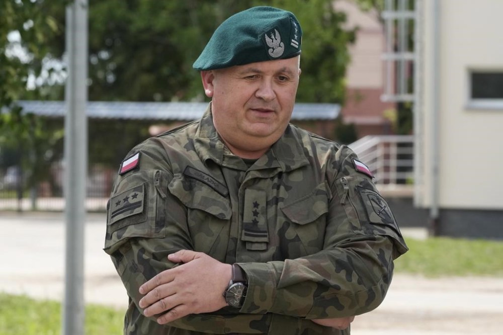 Col. Pawel Galazka, Commander of the 18th Logistics Regiment speaks to The Associated Press in Lomza, Poland, on Thursday June 20, 2024. Galazka's regiment is overseeing training of volunteers taking part in summer training program called