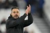 FILE - Brighton's head coach Roberto De Zerbi applauds after the English Premier League soccer match between West Ham and Brighton, at the London stadium in London, on Jan. 2, 2024. Roberto De Zerbi is poised to become Marseille's new coach after the French league club announced they have reached an “agreement in principle.” (AP Photo/Kirsty Wigglesworth, File)