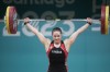 Canada's Maude Charron competes in the women's weightlifting 59kg at the Pan American Games in Santiago, Chile, Sunday, Oct. 22, 2023. Charron, of Rimouski, Que., will lead Canada's two-person weightlifting team at the Paris Olympics.THE CANADIAN PRESS/AP/Moises Castillo