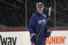 Tampa Bay Lightning head coach Jon Cooper watches during NHL hockey practice, Friday, June 17, 2022, in Denver. Cooper will lead Canada at the 2025 4 Nations Face-Off and the 2026 Winter Olympics, Hockey Canada announced Monday. THE CANADIAN PRESS/AP-John Locher