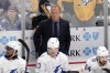 FILE - Tampa Bay Lightning head coach Jon Cooper stands behind his bench during the third period of an NHL hockey game against the Pittsburgh Penguins in Pittsburgh, Saturday, April 6, 2024. Tampa Bay Lightning head coach Jon Cooper will lead Canada at the 2025 4 Nations Face-Off and the 2026 Winter Olympics, Hockey Canada announced Tuesday, June 25. It will be Cooper’s first time as Canada’s head coach since leading the national men’s team to a silver medal at the 2017 world hockey championship. (AP Photo/Gene J. Puskar, File)