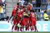 Canada's Jonathan David, not seen, celebrates scoring the opening goal against Peru with teammates during a Copa America Group A soccer match in Kansas City, Kan., Tuesday, June 25, 2024. (AP Photo/Reed Hoffmann)