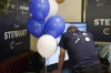 A Conservative supporters watches a split screen displaying voting results and the Stanley Cup final, at an Federal byelection election night event for Toronto-St.Paul's candidate Don Stewart in Toronto on Monday, June 24, 2024.THE CANADIAN PRESS/Chris Young