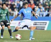 FILE - Kazuyoshi Miura, right, scores a goal during a J-League soccer match against Matsumoto Yamaga, in Yokohama, near Tokyo, on Feb. 26, 2017. The soccer forward known as King Kazu has signed with the Japanese fourth-tier club Atletico Suzuka. (Yohei Fukai/Kyodo News via AP, File)