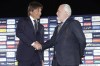 Antonio Conte, left, shakes hands with Napoli President Aurelio De Laurentiis during his official presentation as Napoli soccer team's new coach in Naples, Italy, Wednesday, June 26, 2024. (Alessandro Garofalo/LaPresse via AP)