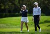 Sisters; Maddie Szeryk, left, and Ellie Szeryk, of Canada, walk together on the first hole while paired together during the first round at the LPGA CPKC Canadian Women's Open golf tournament, in Vancouver, on Thursday, August 24, 2023. THE CANADIAN PRESS/Darryl Dyck