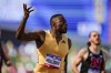 Grant Holloway wins a heat in the men's 110-meter hurdles during the U.S. Track and Field Olympic Team Trials Monday, June 24, 2024, in Eugene, Ore. (AP Photo/George Walker IV)