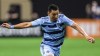 FILE - Sporting Kansas City midfielder Roger Espinoza (15) during the second half of an MLS soccer match against Atlanta United, Sunday, Feb. 27, 2022, in Atlanta. Espinoza, whose last game with Kansas City was in the Western Conference semifinals last November, announced his retirement on Wednesday, June 26, 2024. (AP Photo/Danny Karnik, File)