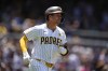 San Diego Padres' Kyle Higashioka rounds the bases after hitting a two-run home run during the second inning of a baseball game against the Washington Nationals, Wednesday, June 26, 2024, in San Diego. (AP Photo/Gregory Bull)