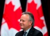 Bank of Canada governor Stephen Poloz gets ready to speak in Toronto on Thursday, December 12, 2019. The Governor General's office has announced 83 new appointments to the Order of Canada. THE CANADIAN PRESS/Nathan Denette