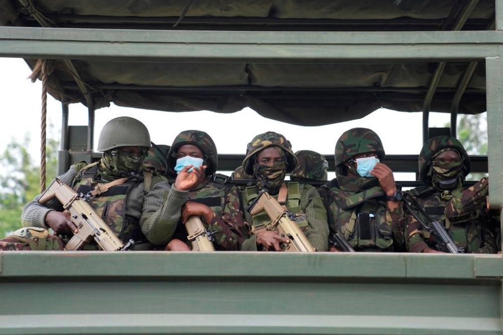 Kenya army soldiers patrol around Nairobi, Kenya Thursday, June 27, 2024. Heavy security was deployed Thursday in Kenya's capital Nairobi ahead of planned protests against a controversial finance bill, despite the president's decision not to sign it after the plans sparked deadly chaos in the capital Tuesday and saw protesters storming and burning part of the parliament building. (AP Photo/Brian Inganga)