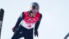 FILE - Stephen Schumann, of the United States, soars through the air during a trial round in the ski jump portion of the individual Gundersen normal hill event at the 2022 Winter Olympics, Wednesday, Feb. 9, 2022, in Zhangjiakou, China. The United States Nordic combined program has lost funding for training and coaching, sending the men and women who compete in ski jumping and cross country skiing scrambling to revive the sport with a new nonprofit. USA Nordic Sport announced Thursday that it informed the Norwegian Federation it did not have enough money to extend their partnership this upcoming season, ending a deal two years into a four-year agreement. (AP Photo/Andrew Medichini, File)